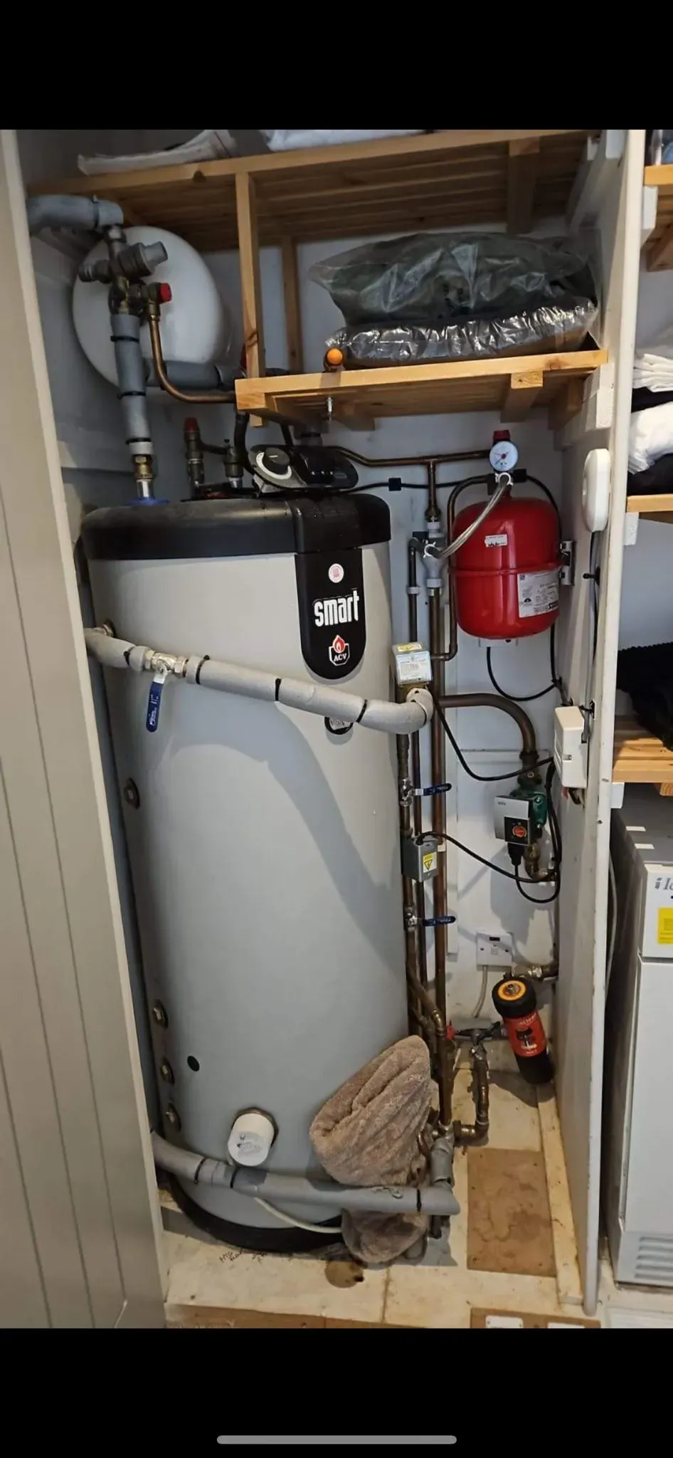 An unvented hot water cylinder installation in a residential property.